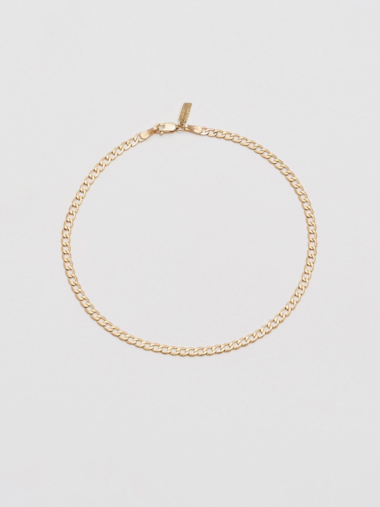 14kt Yellow Gold XL Lightweight Havana Chain Anklet pictured on grey background.