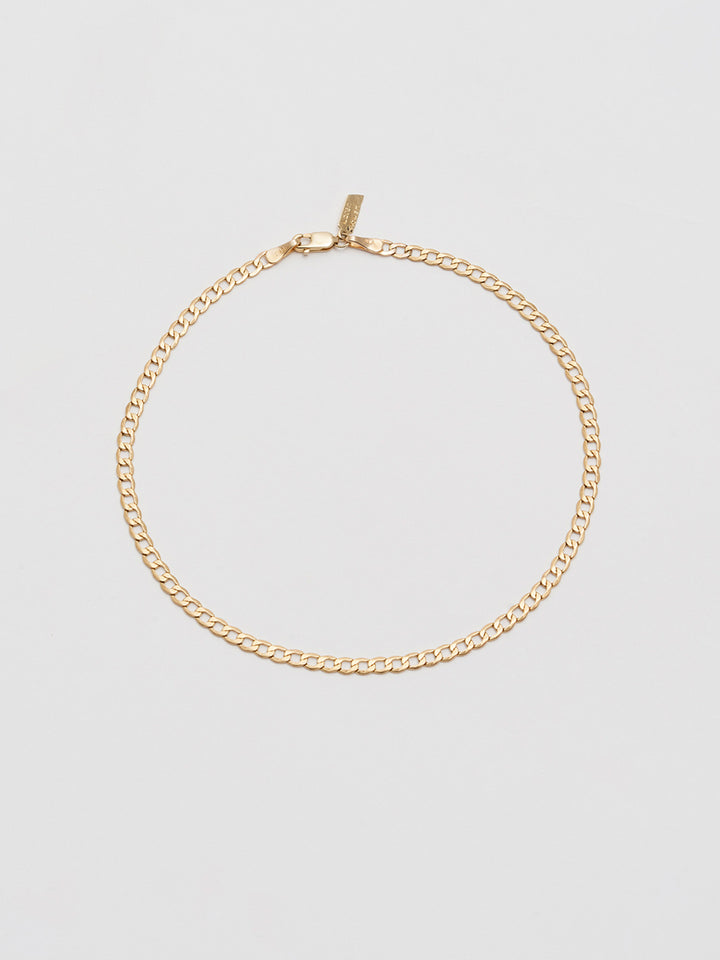 14kt Yellow Gold XL Lightweight Havana Chain Anklet pictured on grey background.