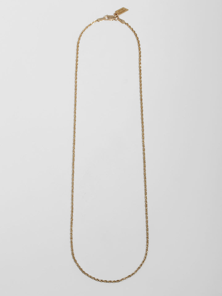 Solid 14kt Yellow Gold Lightweight Rope Chain pictured on light grey background.