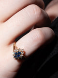 14kt Yellow Gold Diamond & Sapphire Ring shot on model.