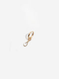 14kt Yellow Gold White Sapphire Bezel Hoop Charm pictured on the Elfin Huggie.