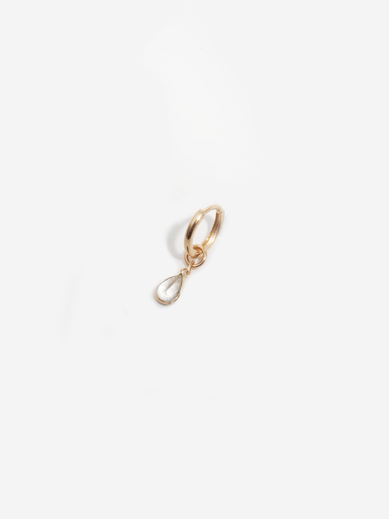 14kt Yellow Gold White Sapphire Bezel Hoop Charm pictured on the Elfin Huggie.