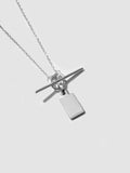Sterling Silver Klint ID & Toggle Necklace pictured on light grey background. Close up.