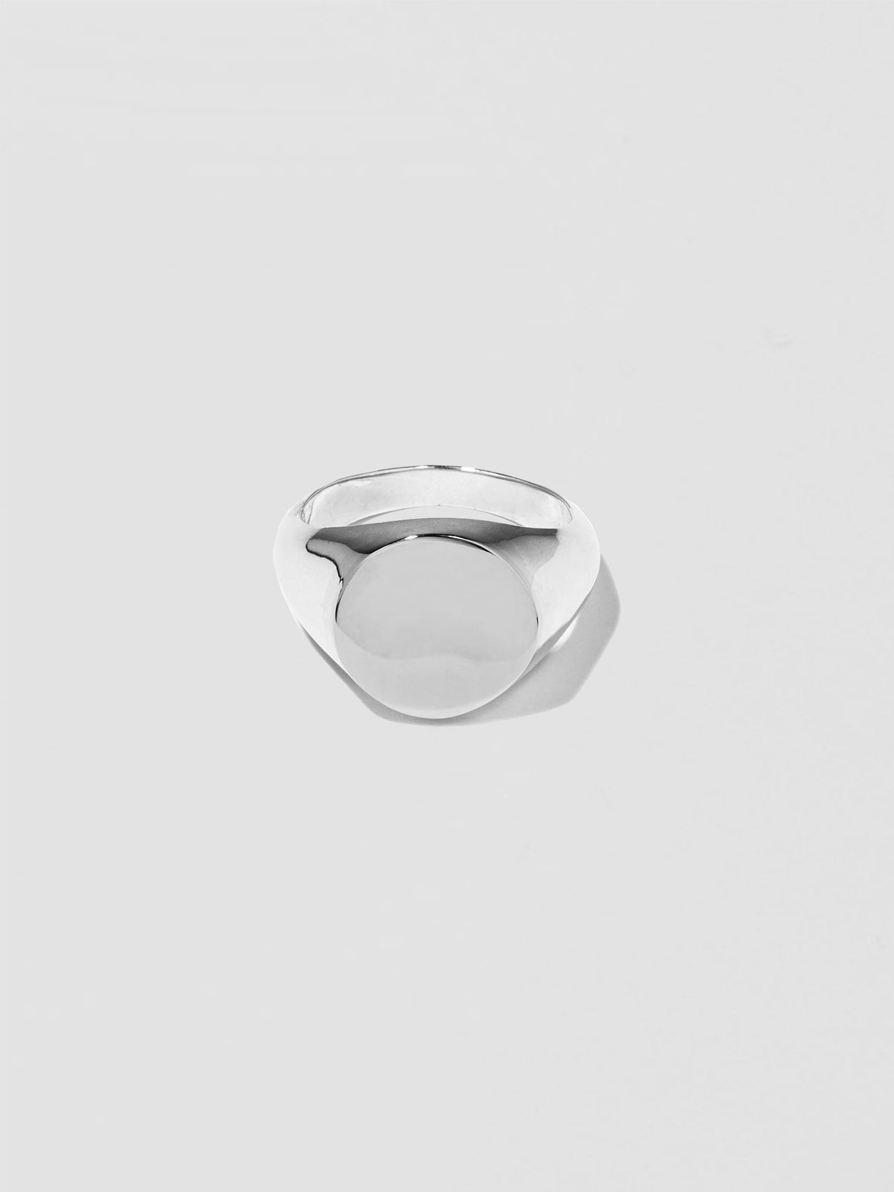 Sterling Silver XL Signet Ring pictured on light grey background. Face on positioning.