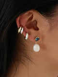  14kt Yellow Gold Domo Ear Cuff pictured along side the Sterling Silver on models ear. 