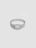 A sterling silver square ID signet ring with a tapered band, displayed against a white background.