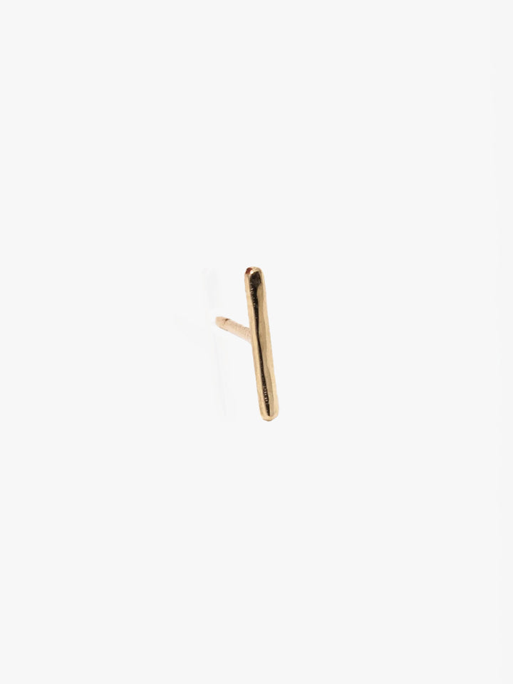 14kt Yellow Gold Rod Stud pictured on light grey background