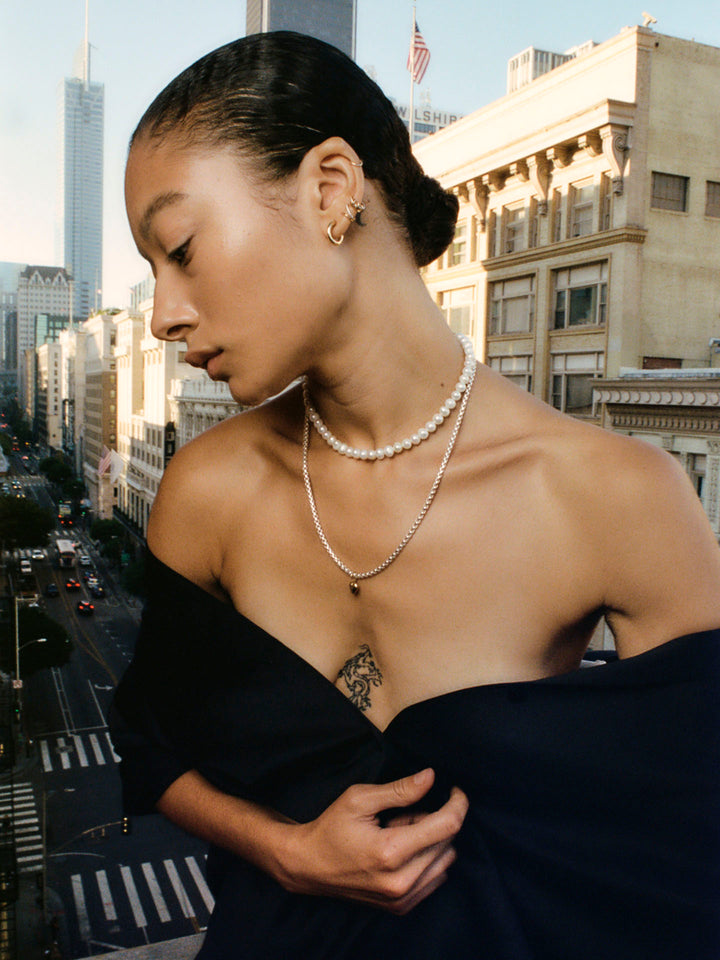 Sterling Silver Round Box Chain pictured on model. 