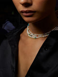 14kt Yellow Gold Opal &amp; Pearl Safety Pin Wrap Strand pictured on model. Close up. Black background. 