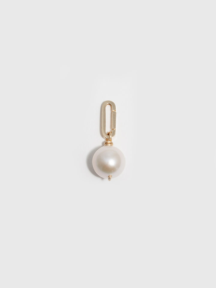 14kt Yellow Gold Pearl Pendant pictured on light grey background. 
