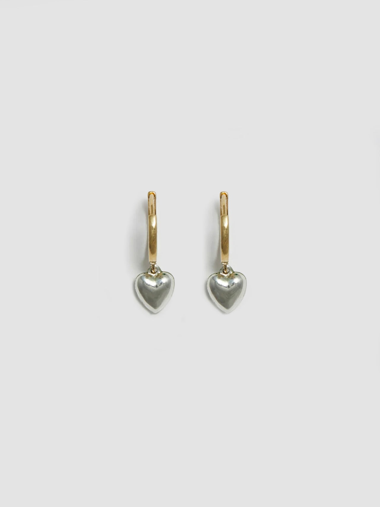 Product Shot of shiny Gordita Heart Huggies (10kt Gold Click On Huggies 11.5mm Diameter Sterling Silver Puff Heart 6mm) shot on white background