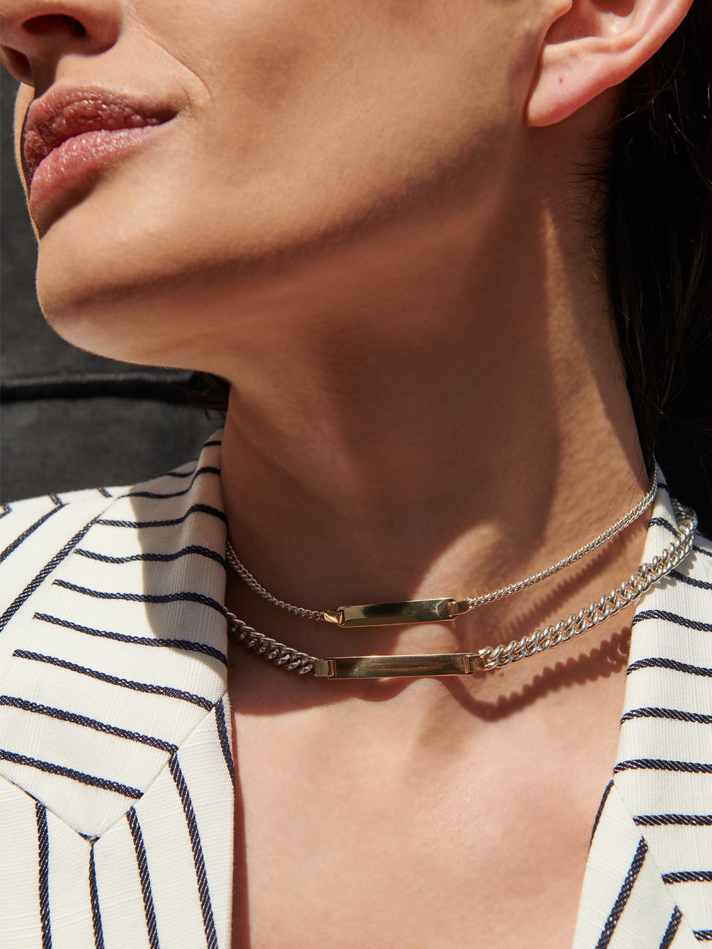 Watts ID Necklace shot on model with Mini Watts ID Necklace.