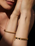 Vermeil Flat Curb Chain Bracelet pictured on models wrist.