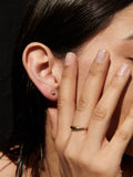 14Kt Yellow Gold Sphere Stud Earrings pictured on model.