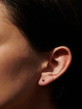 14Kt Yellow Gold Sphere Stud Earrings pictured on model.