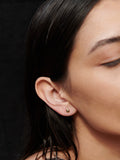  14Kt Yellow Gold Droplet Stud Earring pictured on model. 