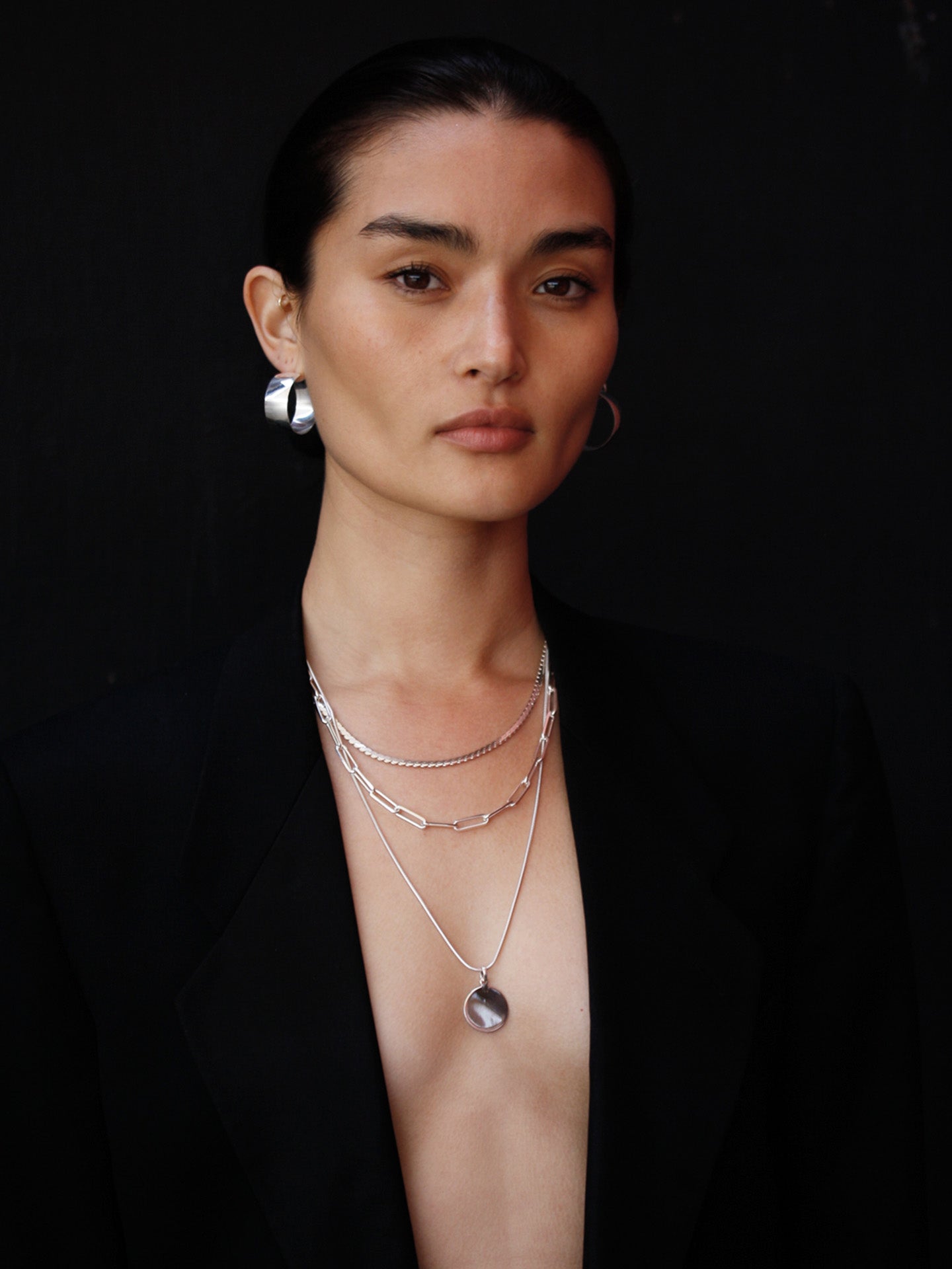 Sterling Silver Squared Snake Chain Necklace pictured on model in 24" length. 