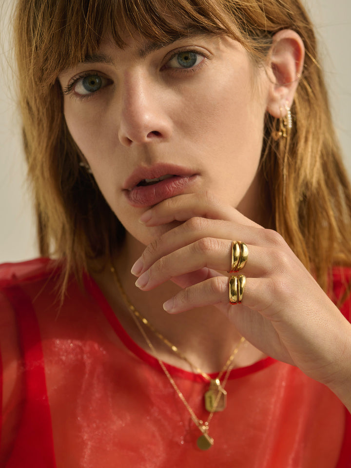 14kt Yellow Gold Dome Band pictured on models pinky finger. 