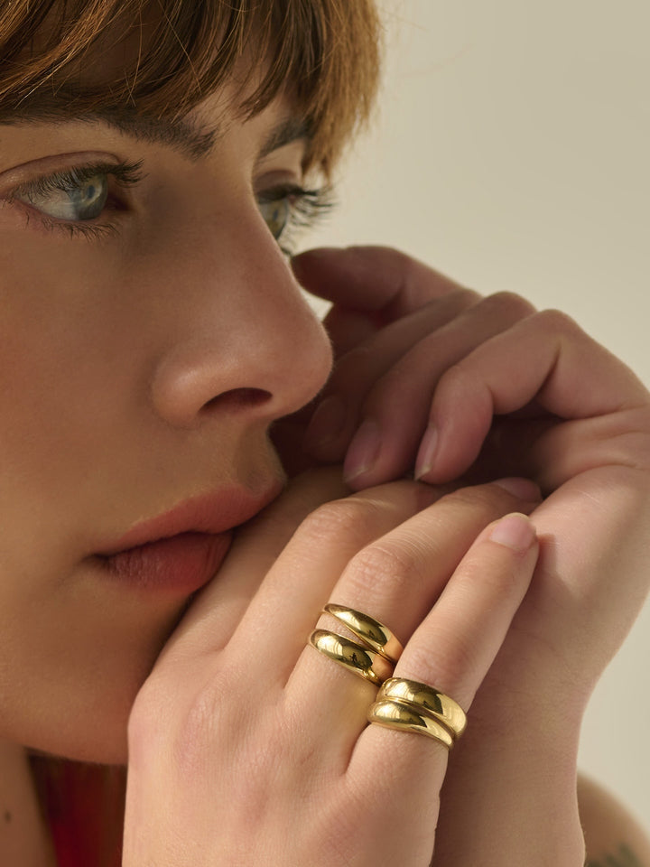 14kt Yellow Gold Dome Band pictured on models pinky finger. 