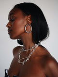 Sterling Silver Tube Hoops pictured on model.