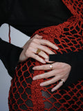 Amore signet ring in vermeil pictured on models left hand on ring finger. 