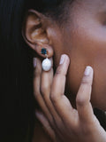 Gem Baroque Link Earrings pictured on models ear. 