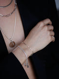 Petite Industrial Box Link Chain Bracelet pictured on models wrist. 
