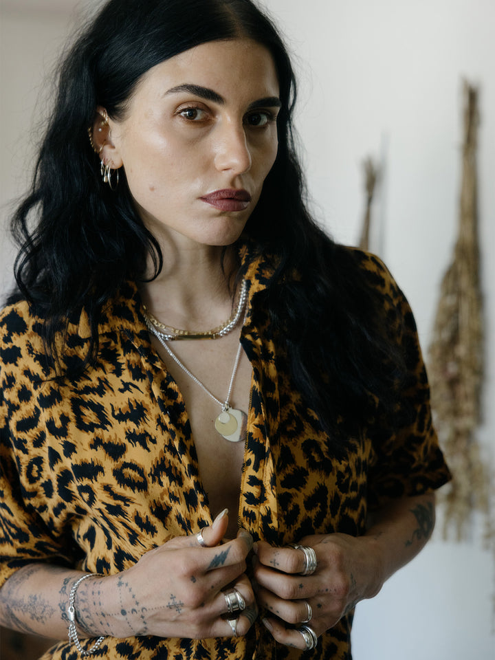 XL Sterling Silver Disk Pendant pictured stacked with the Yellow Gold Disk and Mini Sterling Silver Disk Pendants.