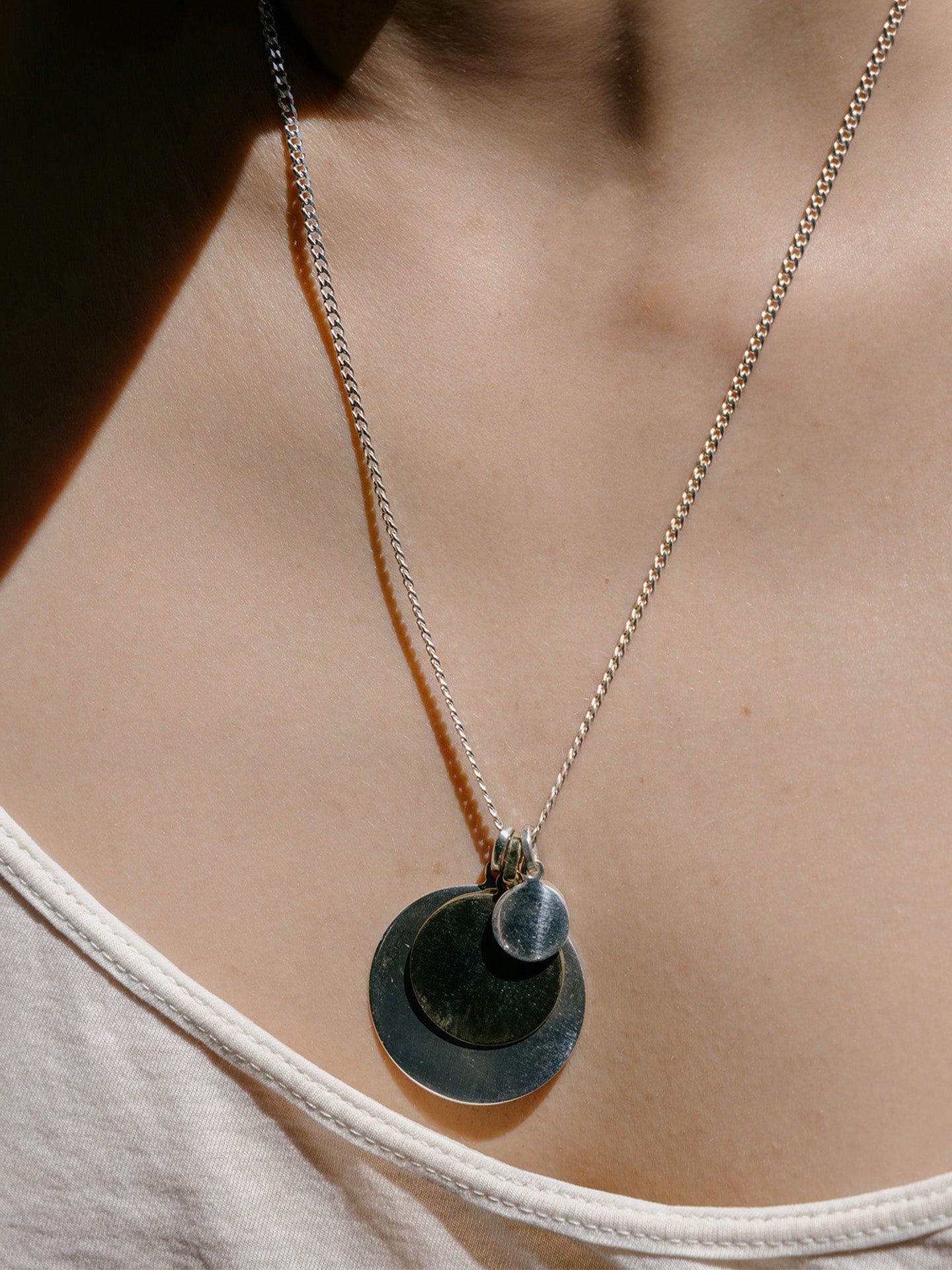 Sterling Silver Mini Disk Pendant stacked with the 14k Gold Disk and XL Sterling Silver Disk Pendants on the Sterling Silver Petite Havana Chain.