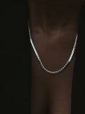 Serpentine Chain pictured in Sterling Silver on models neck. 