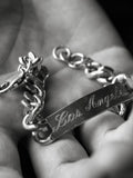 Sterling Silver Solid Curb Chain ID Bracelet engraved with Los Angeles in Script font. 
