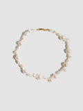 14kt Yellow Gold Bellissimo Pearl Bracelet pictured on light grey background.