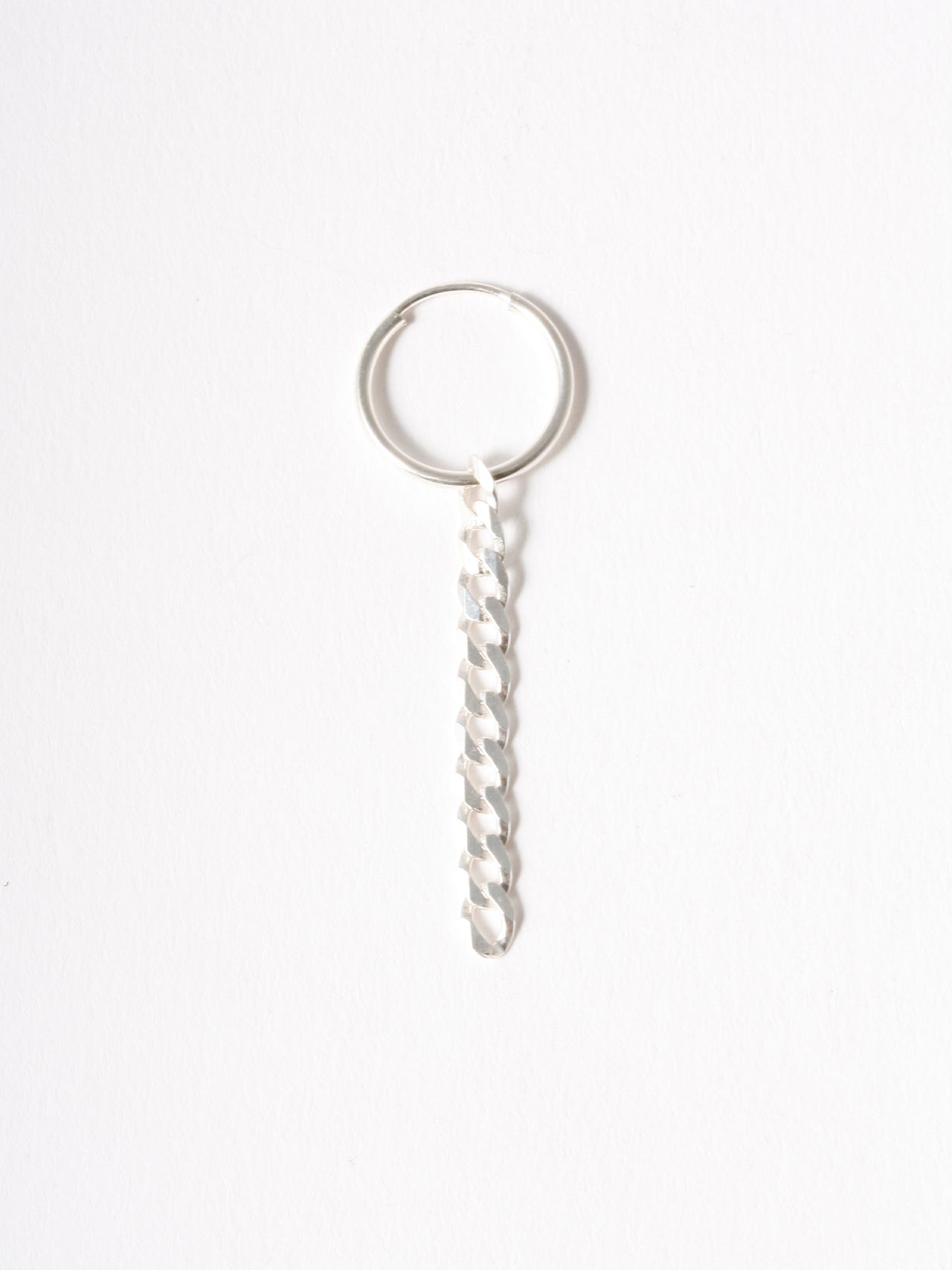 Sterling Silver Chain Huggie pictured on light grey background.