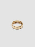 14kt Yellow Gold Dome Band pictured on light grey background. 