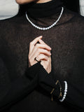 Genesis Pearl Necklace pictured on model. 