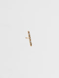 14kt Yellow Gold Solo Diamond Rod Stud Earring pictured on light grey background. Single.
