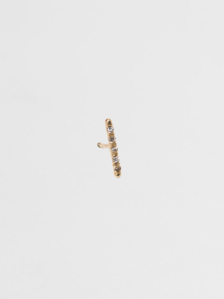 14kt Yellow Gold Solo Diamond Rod Stud Earring pictured on light grey background. Single.
