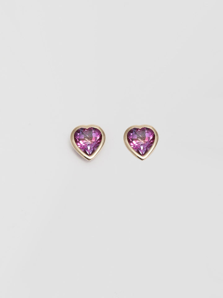 Pink Crush Earrings shot on white background.14kt Yellow Gold Pink Topaz Crush Studs pictured on light grey background. 