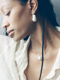 14kt Yellow Gold Baroque Pearl on Fairy Floss Necklace pictured on model. 