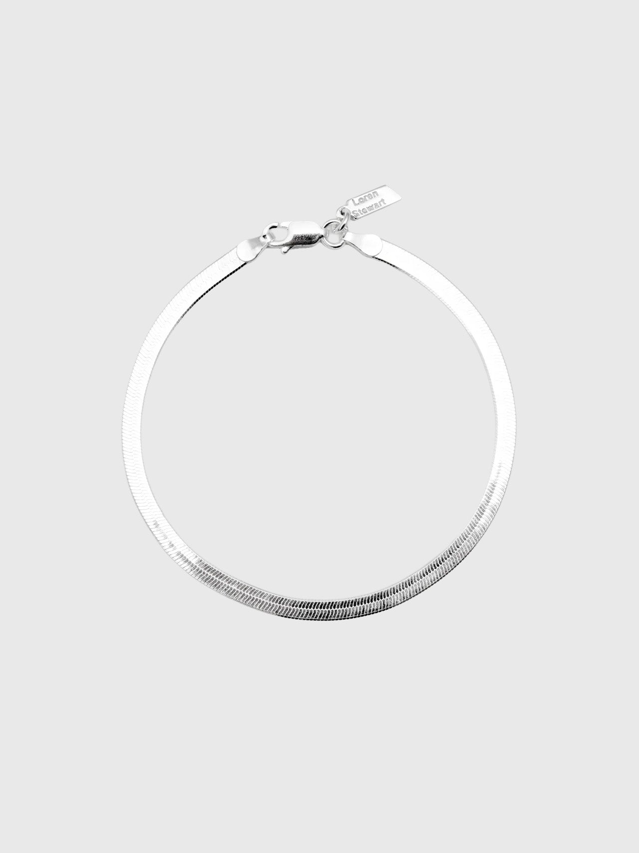 Sterling Silver Herringbone Bracelet: Sterling Silver Herringbone Chain Bracelet  Length: 7”  Width: 3.5mm