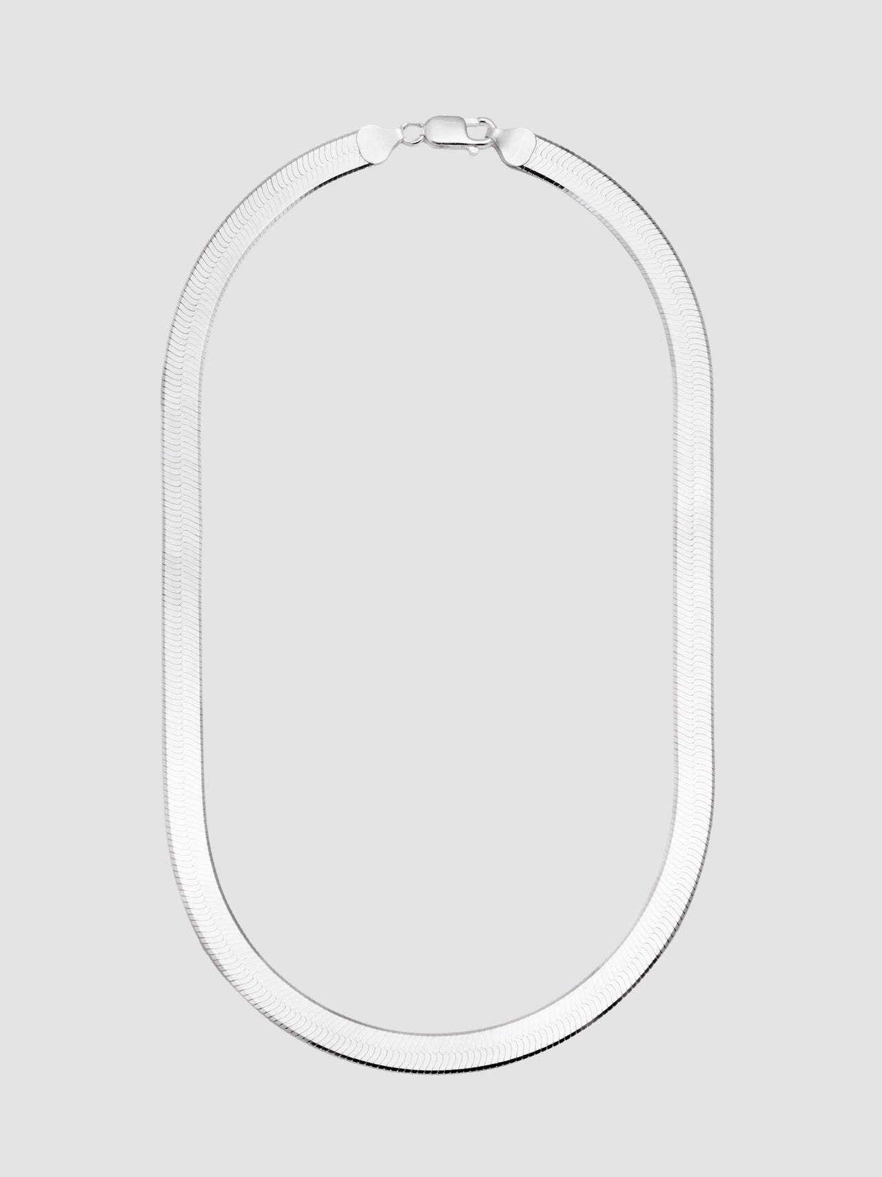 Sterling Silver Herringbone Chain Necklace shot on light grey background.