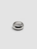 A sterling silver band pictured on light grey background.
