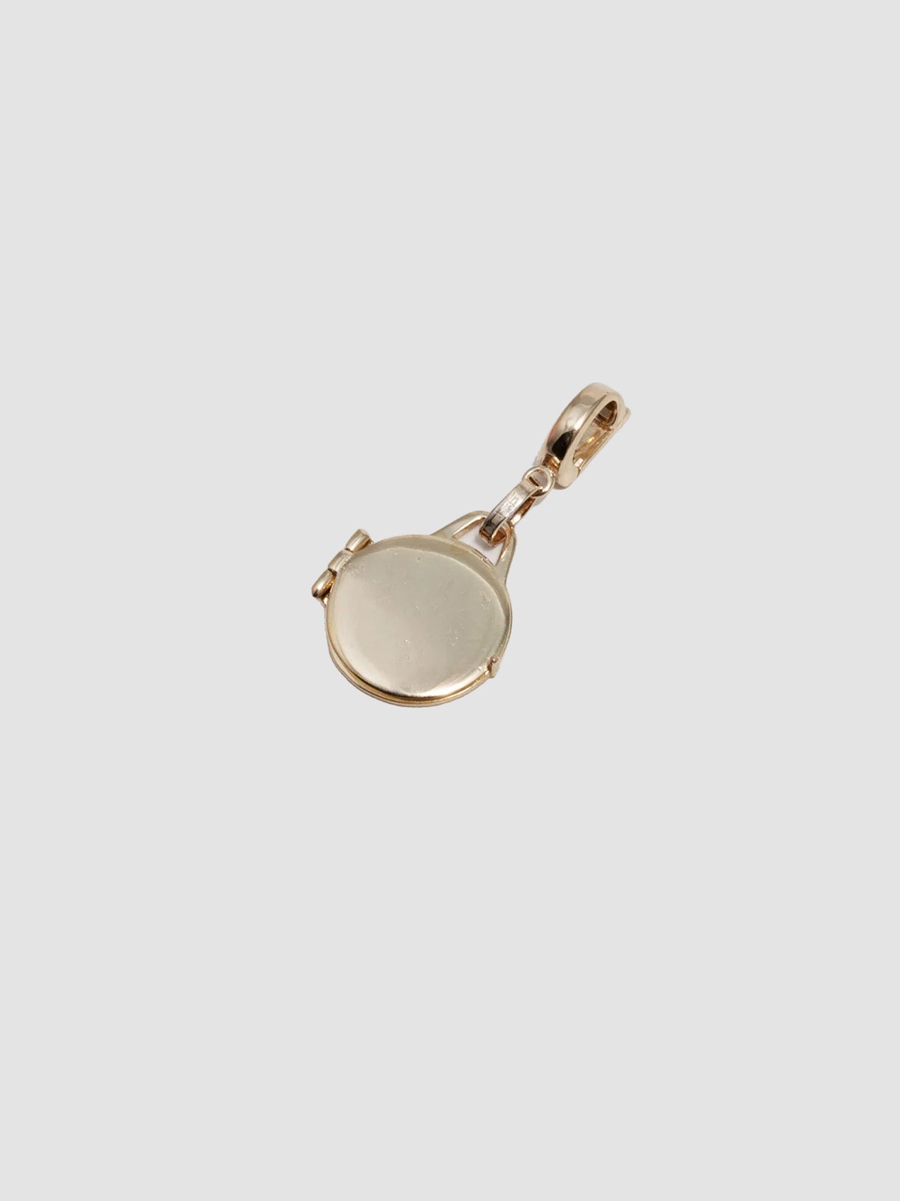 14Kt Yellow Gold Locket Pendant pictured on light grey background. 