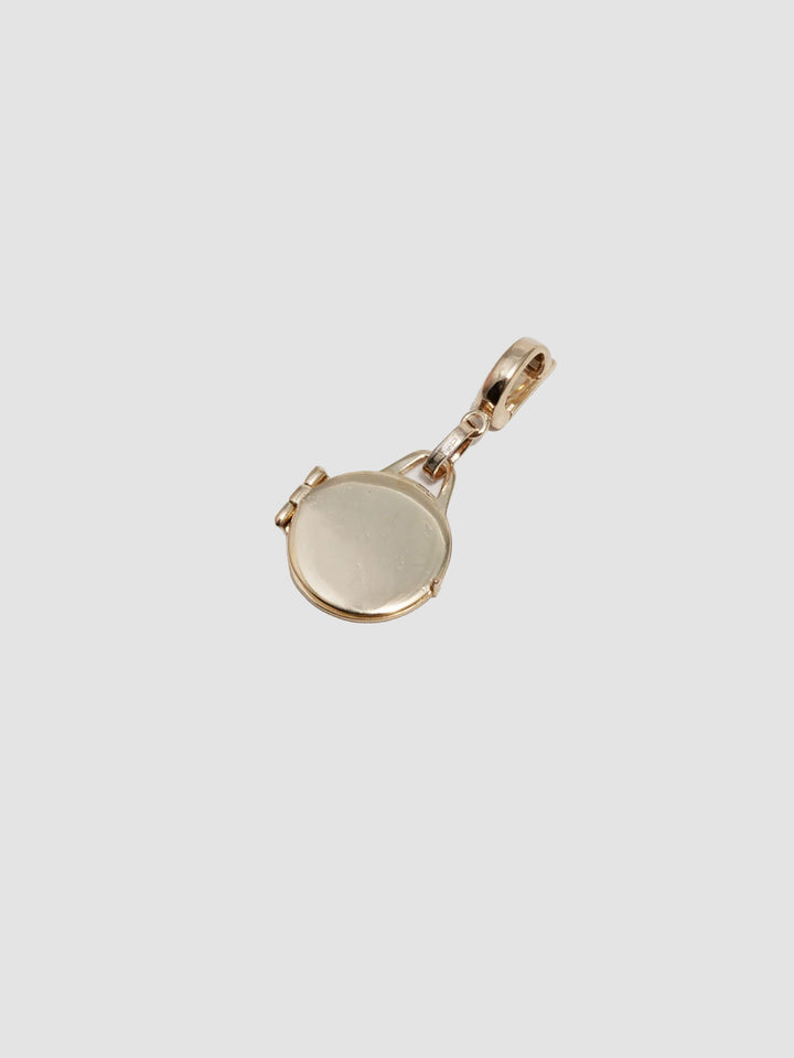 14Kt Yellow Gold Locket Pendant pictured on light grey background. 