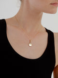 14Kt Yellow Gold Locket Pendant pictured on model. 