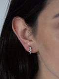 Model pictured wearing Sterling Silver Knots Studs. 