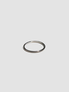 A sterling silver ring pictured on light grey background.
