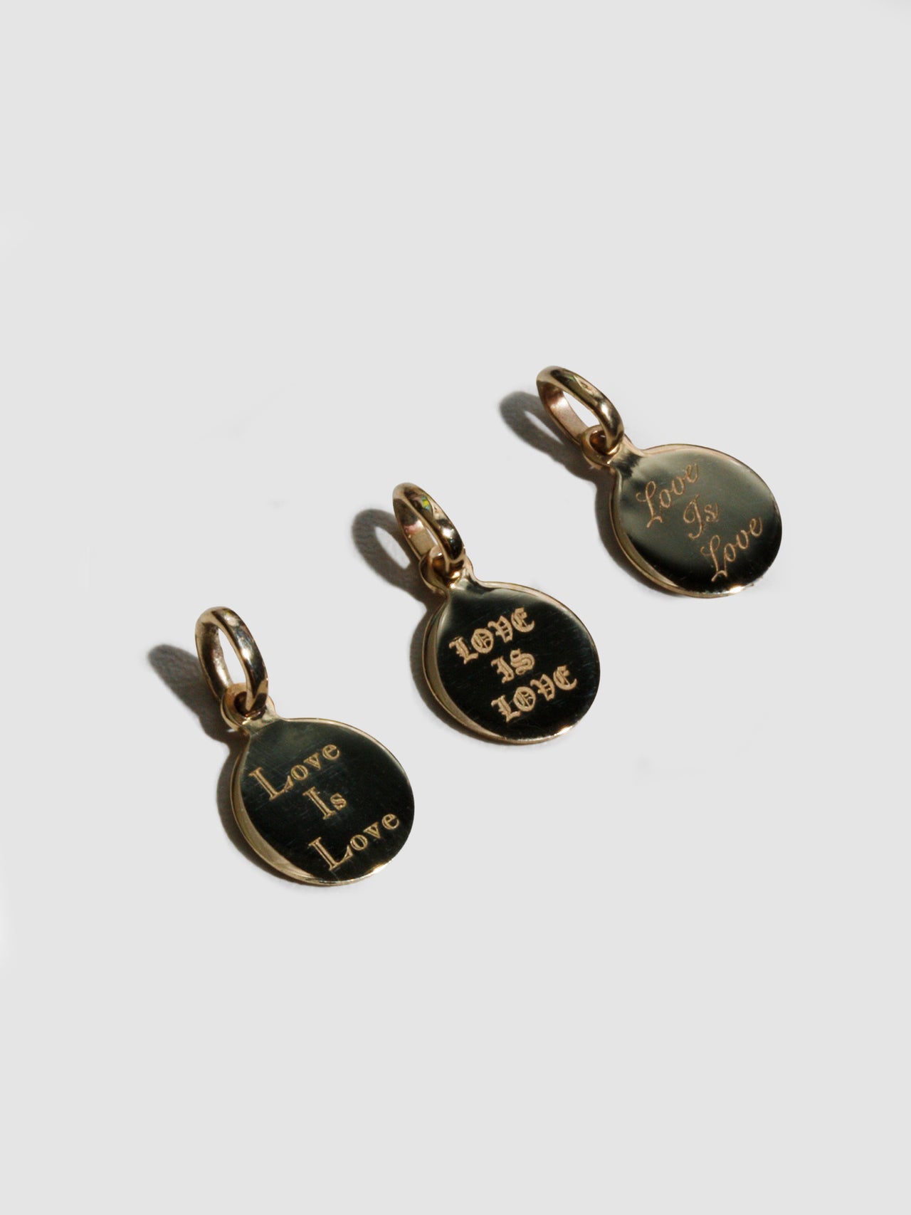 'Love Is Love' Mini Disk Pendant