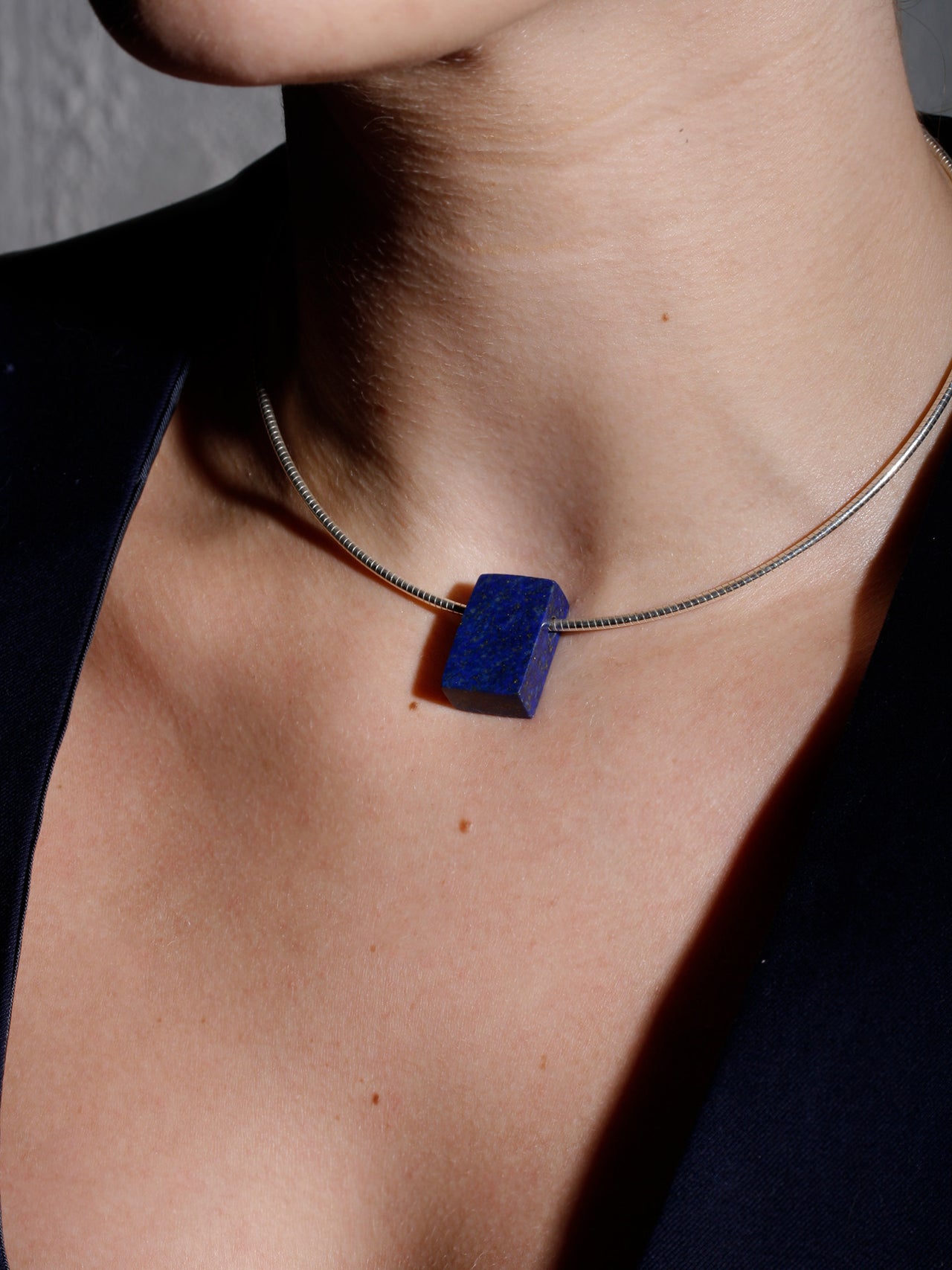 Sterling Silver Lapis Cube Necklace shot on model close up.