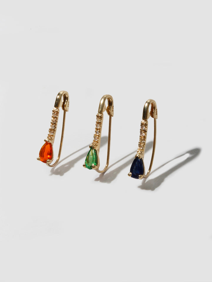 14kt Yellow Gold Mini Diamond Fire Opal Safety Pin pictured with the Tsavorite and Dark Blue Sapphire. 